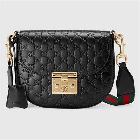 gucci signature leather shoulder bag|Gucci textured leather shoulder bag.